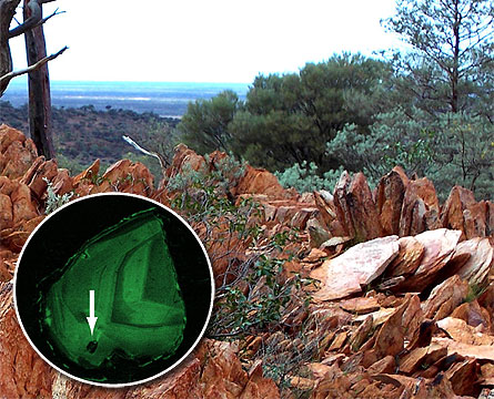Rocks in the Jack Hills of Western Australia hosted zircon crystals that contain tiny mineral inclusions, such as the one denoted by the arrow in the false-color inset. The zircons and inclusions are more than 4 billion years old and contain evidence suggesting an early start for tectonic activity on Earth.