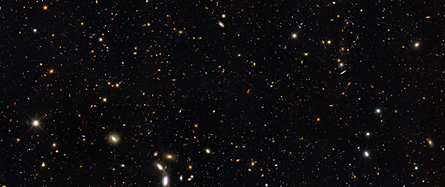 Hubble’s multiwavelength portrait of cosmic history, ranging from the ultraviolet (blue) to the infrared (red), reveals the evolution of galaxies over a 12-billion-year span, beginning less than a billion years after the Big Bang. Credit: NASA; ESA; R. Windhorst, S. Cohen, M. Mechtley, M. Rutkowski/Arizona State Univ., Tempe; R. O'Connell/Univ. of Virginia; P. McCarthy/Carnegie Observatories; N. Hathi/UC Riverside; R. Ryan/UC Davis; H. Yan/Ohio State Univ.; A. Koekemoer/STScI