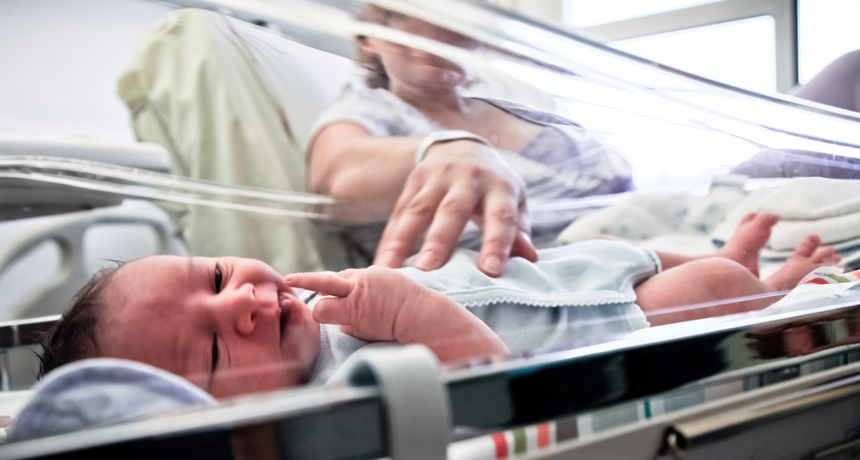 newborn baby and mother in hospital