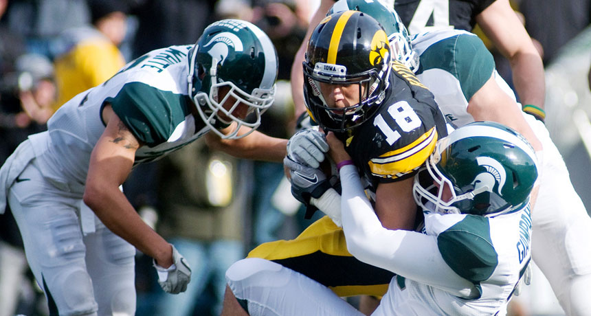 football tackle in a college game