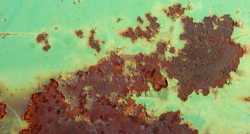 rust on green metal