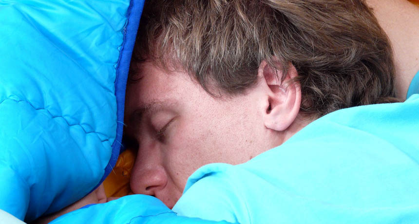 male camper sleeping