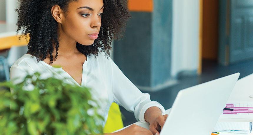 person looking at computer