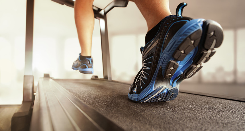 person running on treadmill