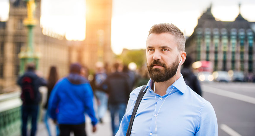 Man wears earbuds