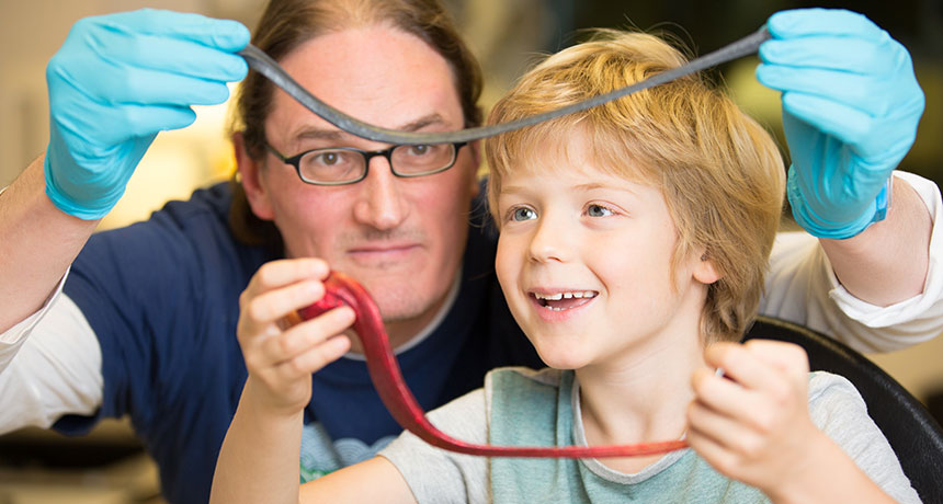 scientist and son show Silly Putty and Silly Putty + graphene