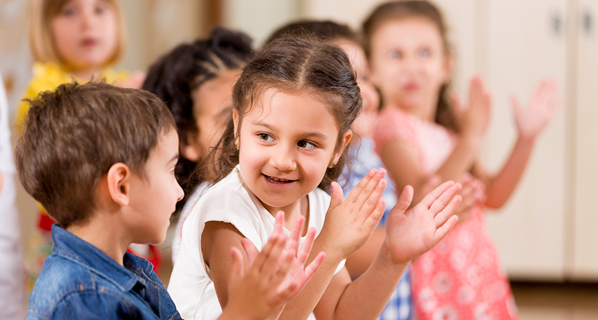 kids clapping in preschool classroom