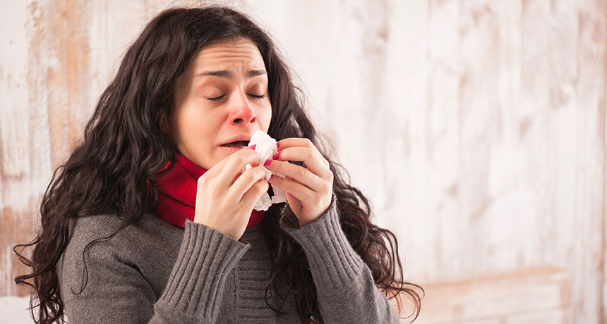 girl sneezing