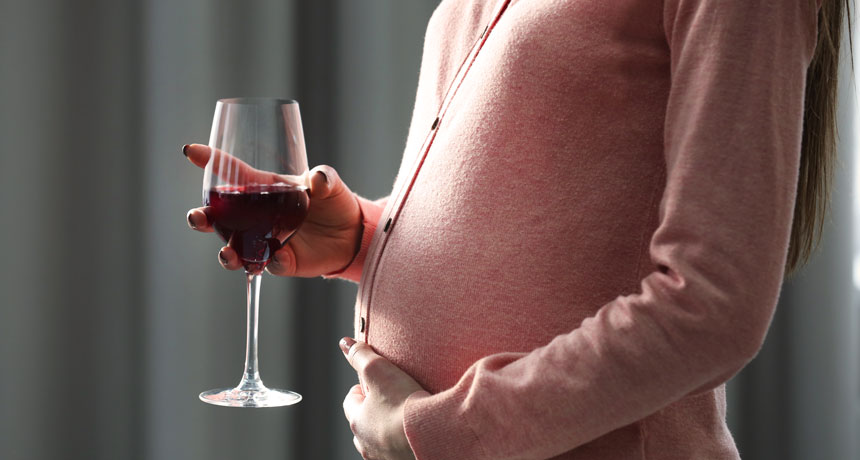 pregnant lady drinking wine