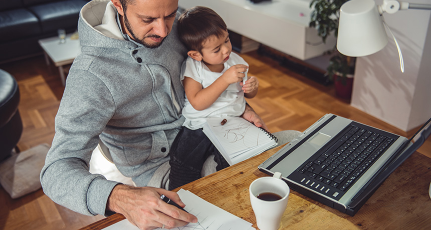 man working with toddler