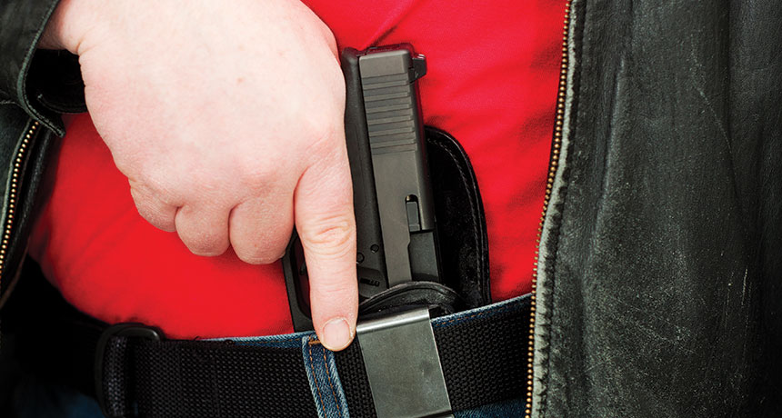 person holding gun