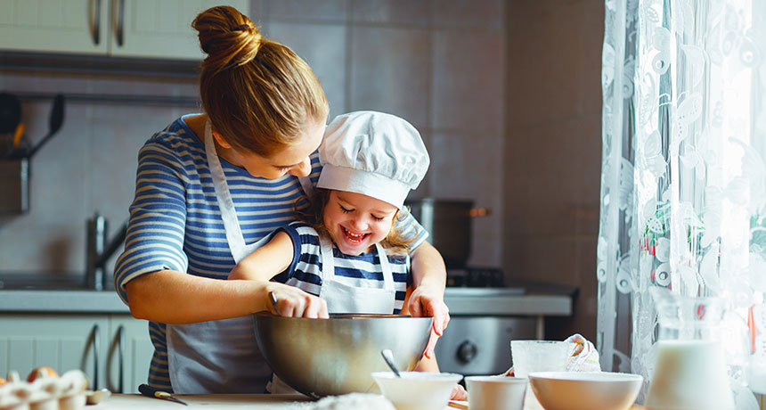 child helping mom bake