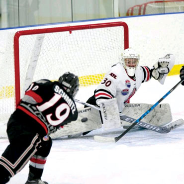Connor playing hockey