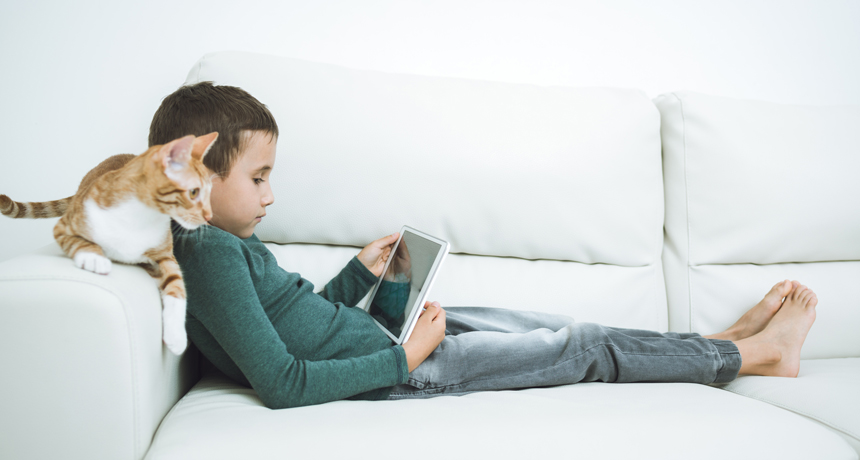 kid using tablet
