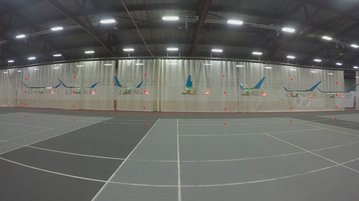 a composite photo showing the new aircraft flying across a warehouse