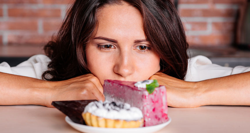 woman staring at cake