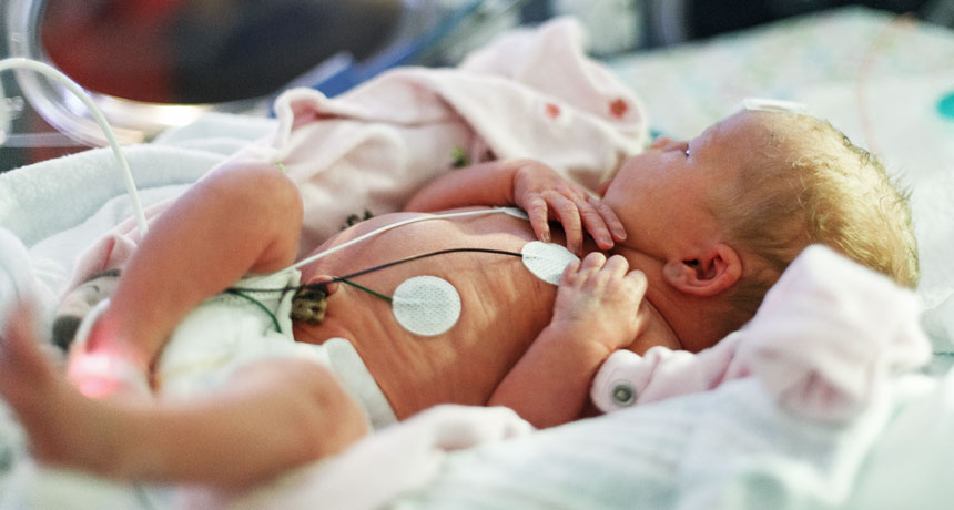 baby wearing wire sensors