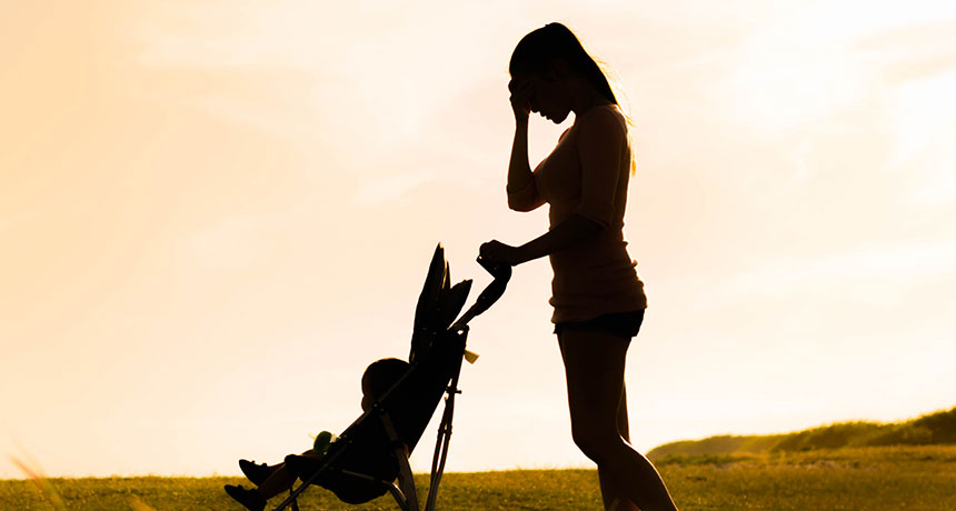 mother pushing stroller