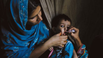 administering a polio vaccine