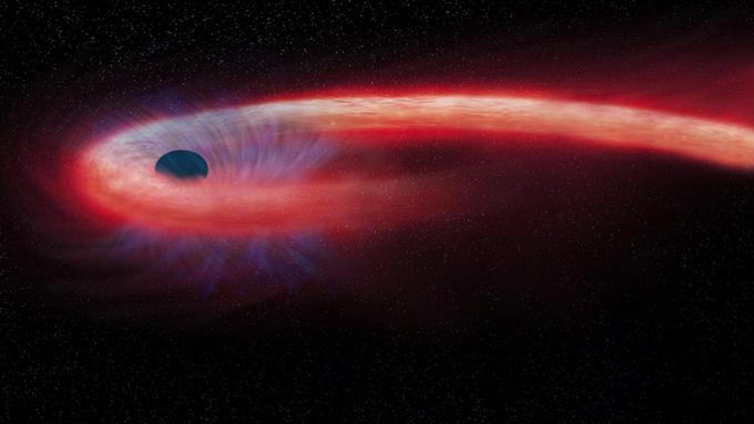 an illustration of a black hole ripping a star apart