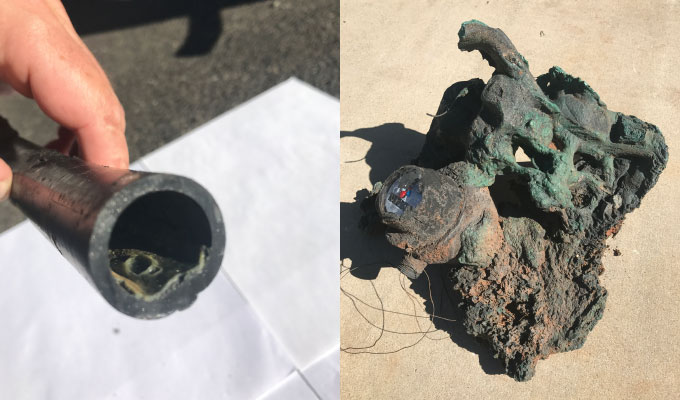 burned plastic pipe and meter box