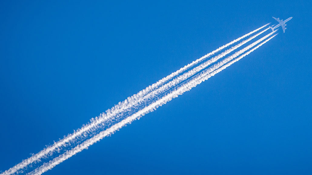 Jet flying across sky