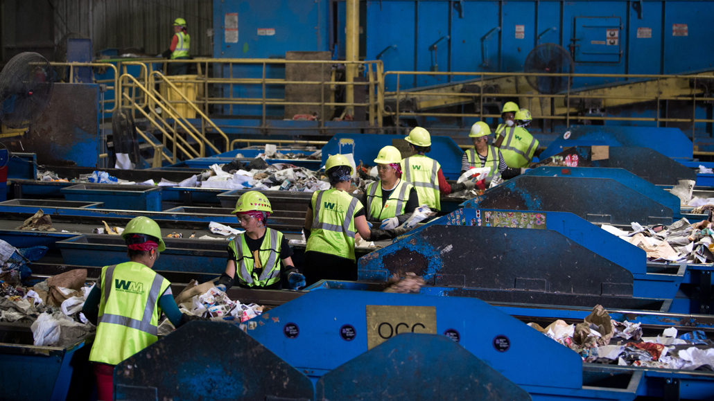 workers sorting at a waste management facility