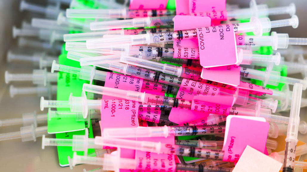 syringes of Pfizer’s COVID-19 vaccine
