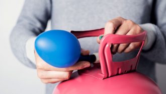 a balloon being filled with helium