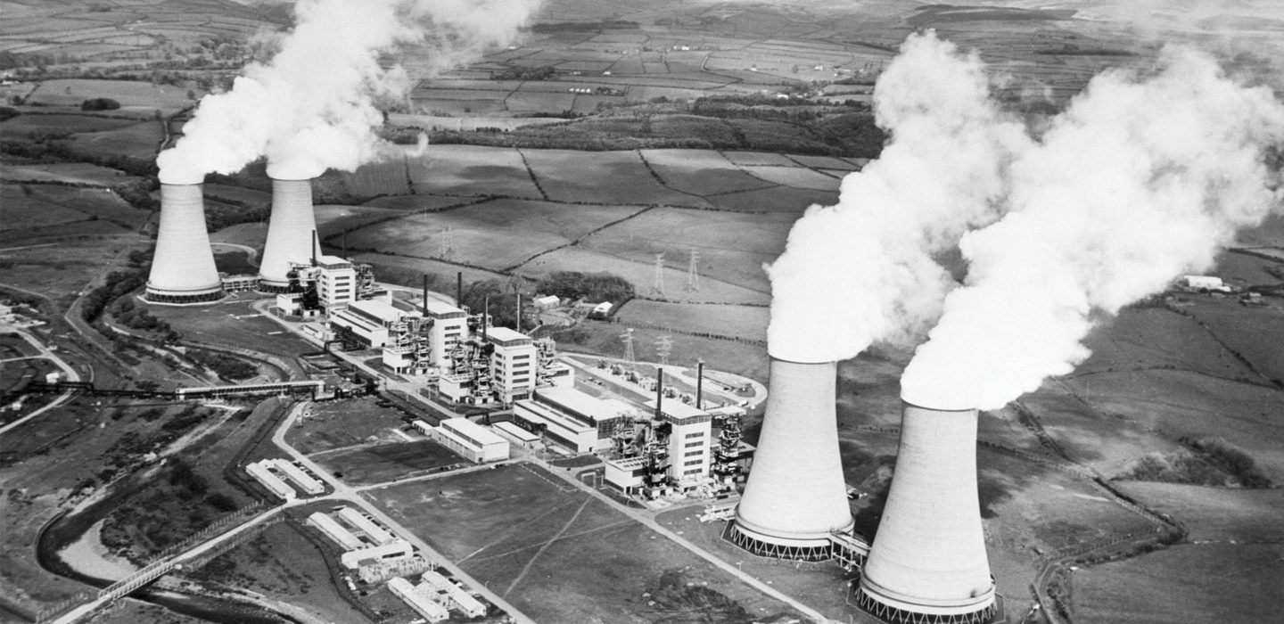 black and white image of Calder Hall power plant smokestacks