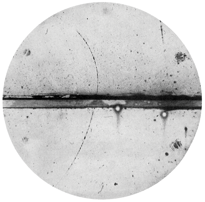 black and white image of a particle track cloud chamber