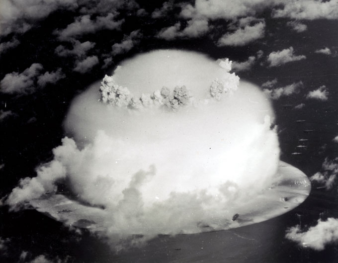 black and white image of a mushroom cloud at Bikini Atoll