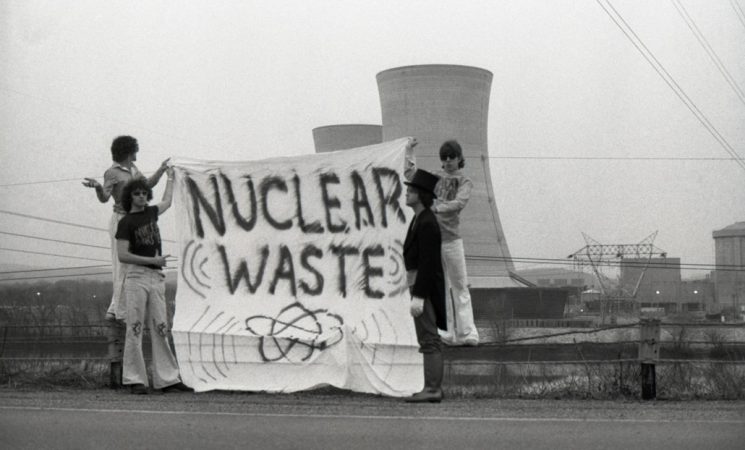 protesters standing in front of Three Mile Island reactor