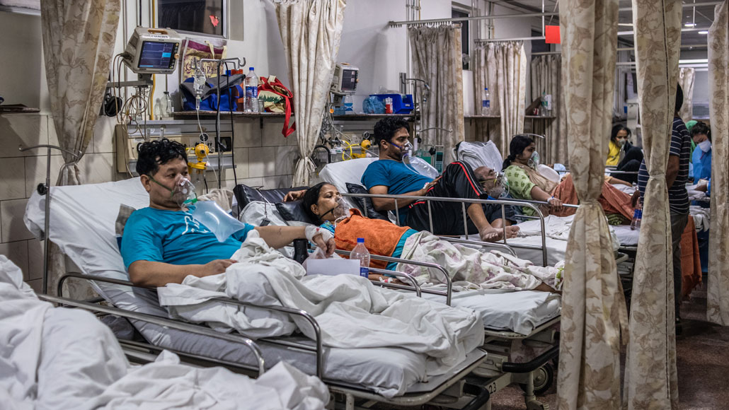 covid patients in beds at a New Delhi hospital