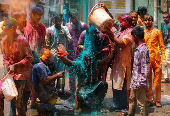 people participating in Holi