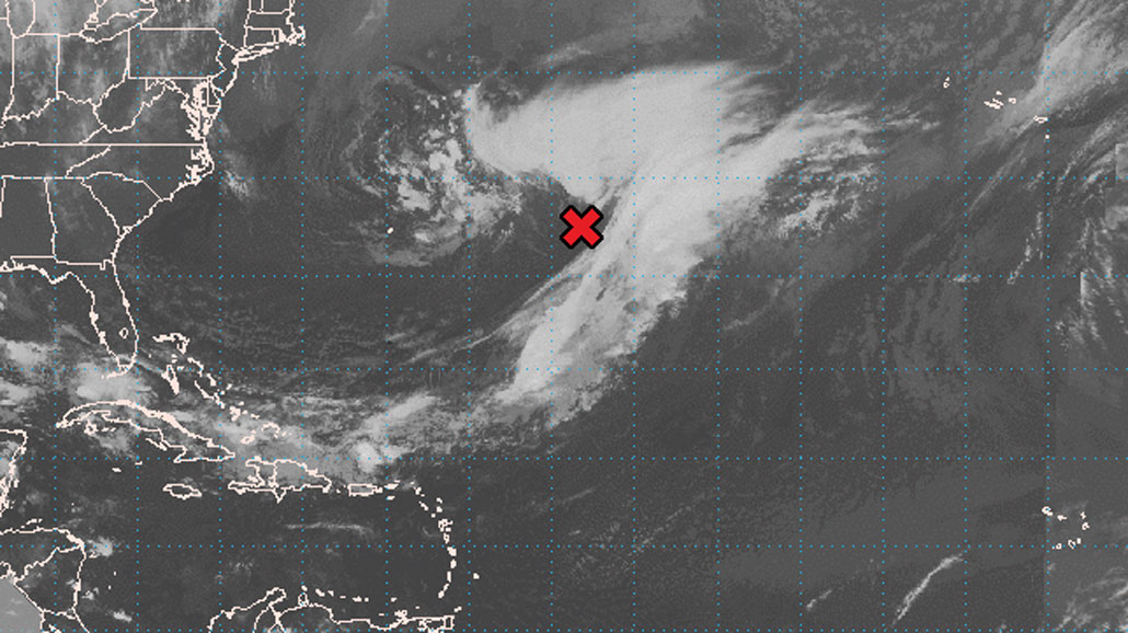 radar image of Subtropical Storm Ana marked with a red x