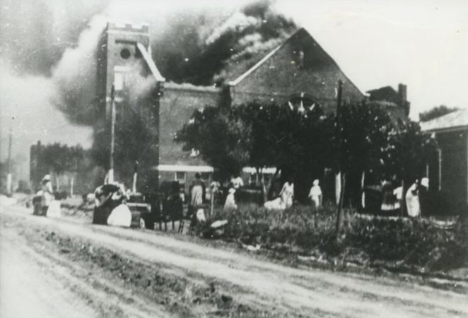 black and white image of Mt. Zion Baptist church on fire