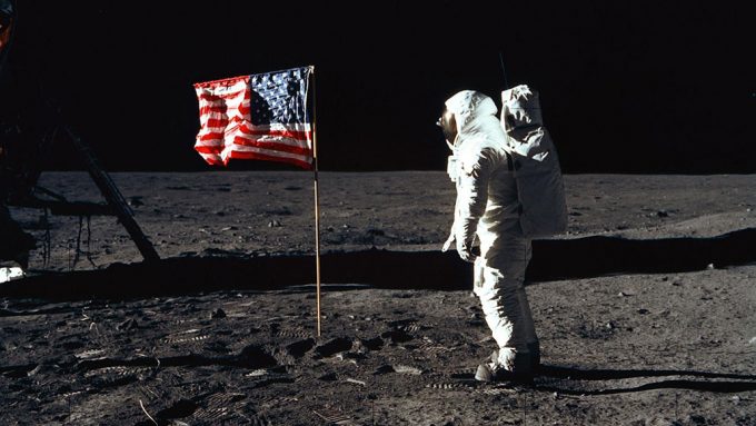 a photo of an astronaut at the Apollo 11 moon landing site