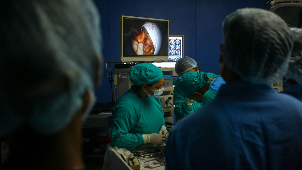 image of doctors performing surgery on a mucormycosis patient in India
