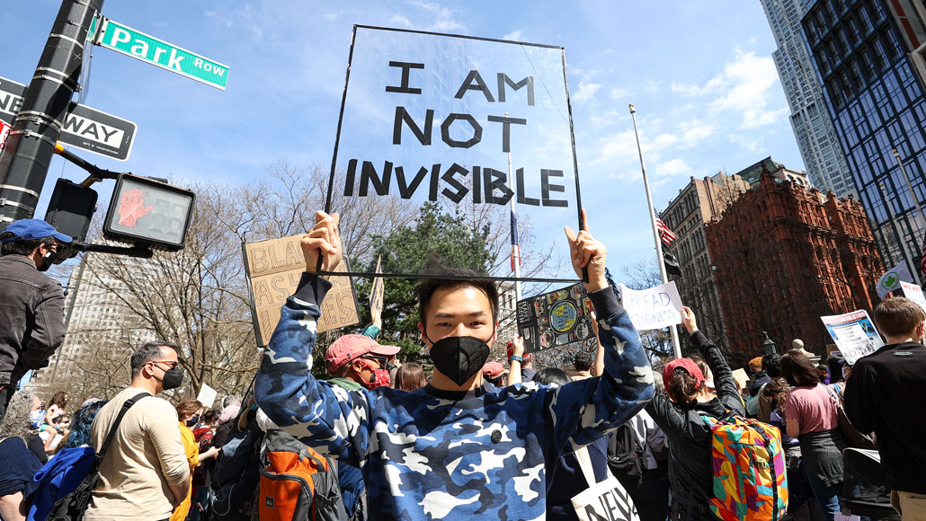 Protesters gathered in New York City in March in the wake of the Atlanta spa shootings to draw attention to escalating hate directed at Asian American