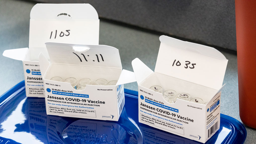 image of three boxes of vials containing Johnson & Johnson's COVID-19 vaccine