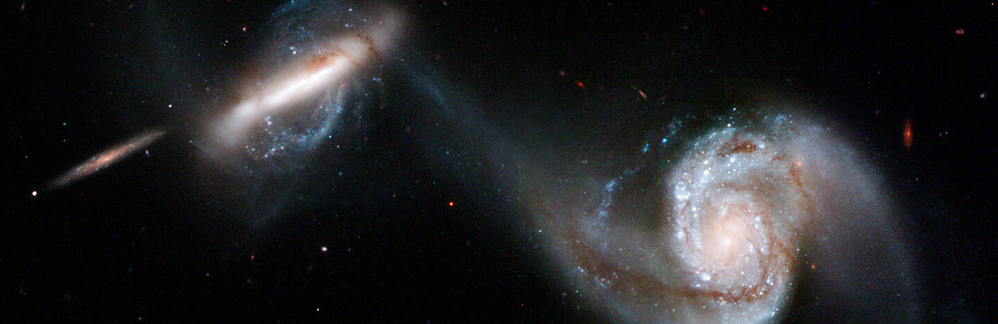 two galaxies on a black background