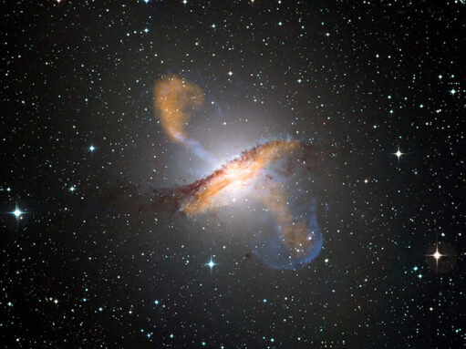 a galaxy with two large lobes and jets bursting from its central black hole