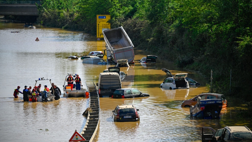 cars stranded on a flooded out highway