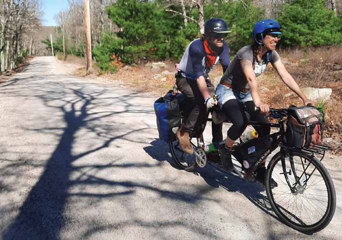 image of Liza Burkin and Tyson Bottenus on a tandem bike