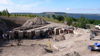 image of archaeologists excavating at a site in Germany