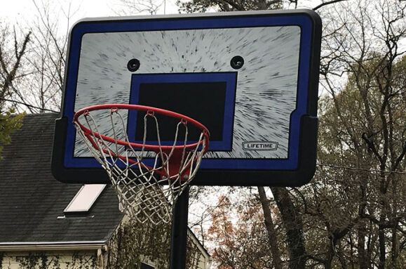 image of a basketball hoop that looks like a face