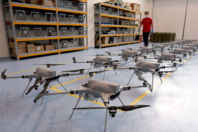 photo of two lines of STM Kargu drones in a warehouse