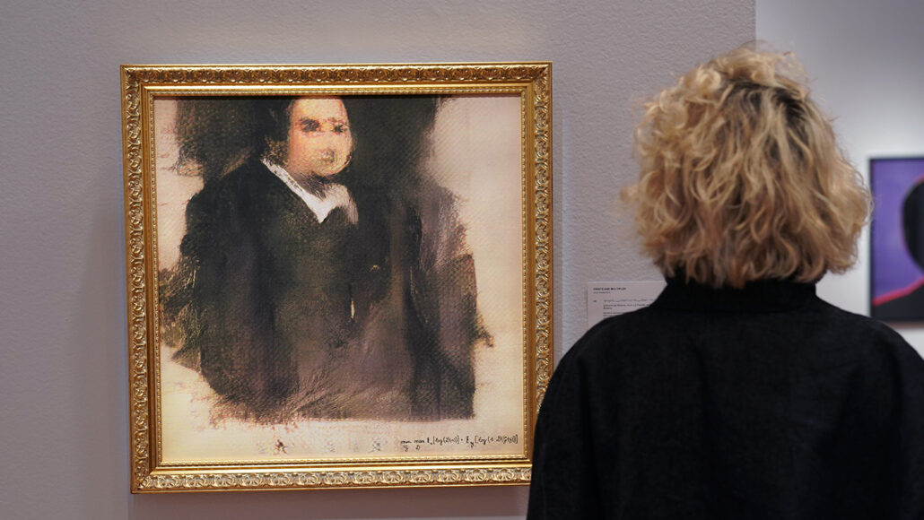 photo of a person looking at the "Edmond de Belamy" portrait