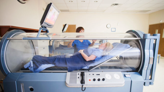 a photo of a person in a hyperbaric chamber